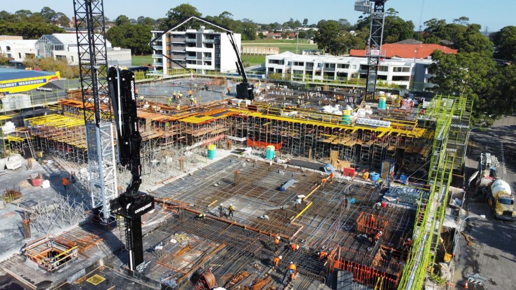 Apex formwork crews on a suspended slab deck at Caringbah Pavilion