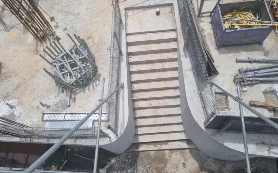 In-situ concrete stair with curved walls formed by Apex